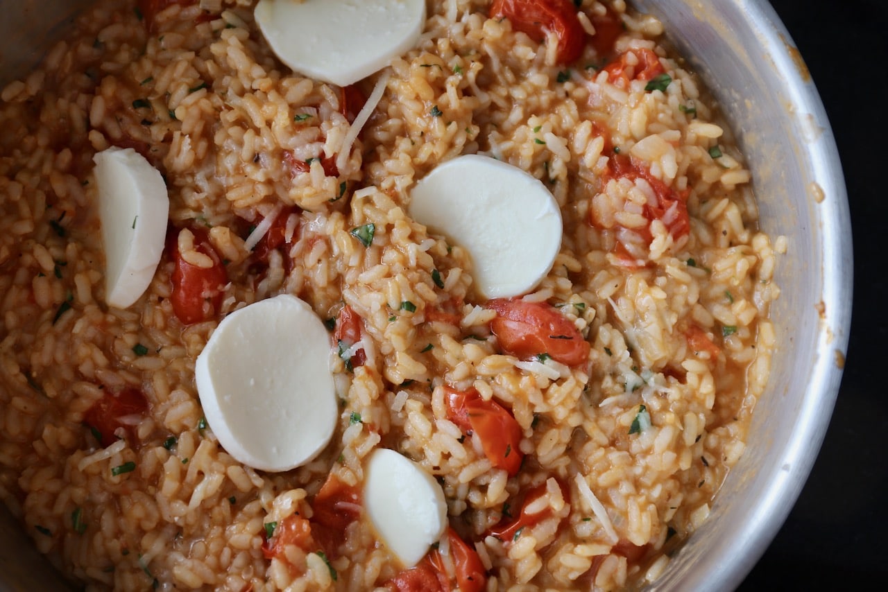 Caprese Risotto features tomatoes, basil and mozzarella cheese.