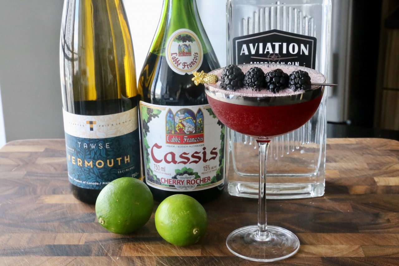 Serve this elegant Cassis Cocktail recipe in a coupe glass.