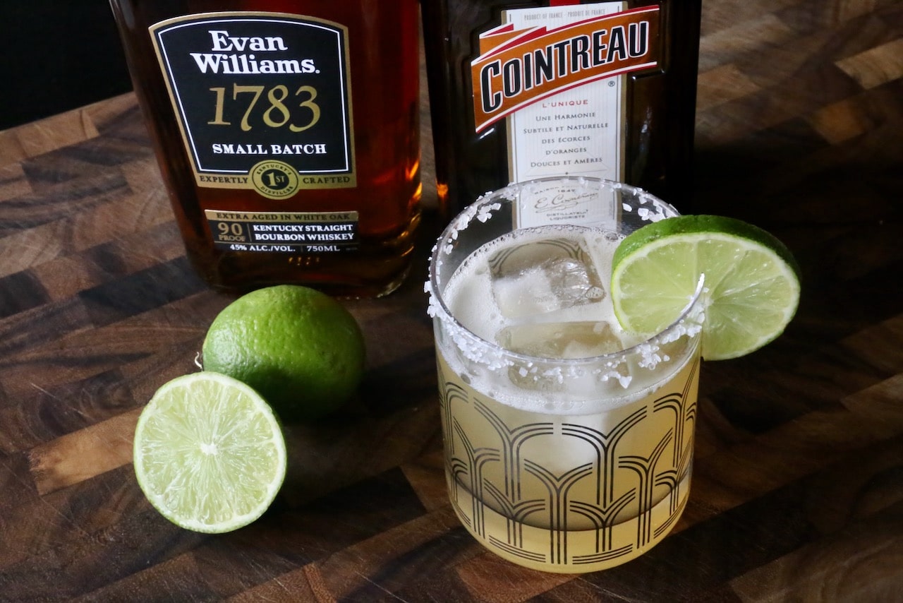 Serve this margarita in a rocks glass muddled with ice.