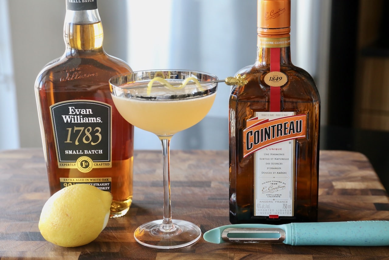 Serve a classic Whiskey Sidecar in an elegant coupe glass.