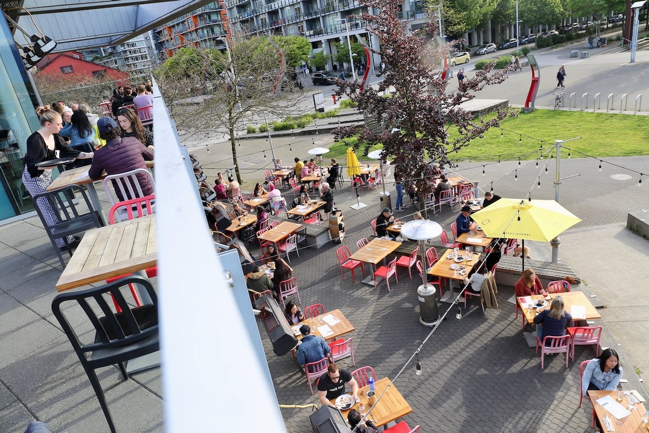 Where To Eat In Vancouver's Olympic Village: Enjoy beautiful views at Tap & Barrel's sprawling patio.