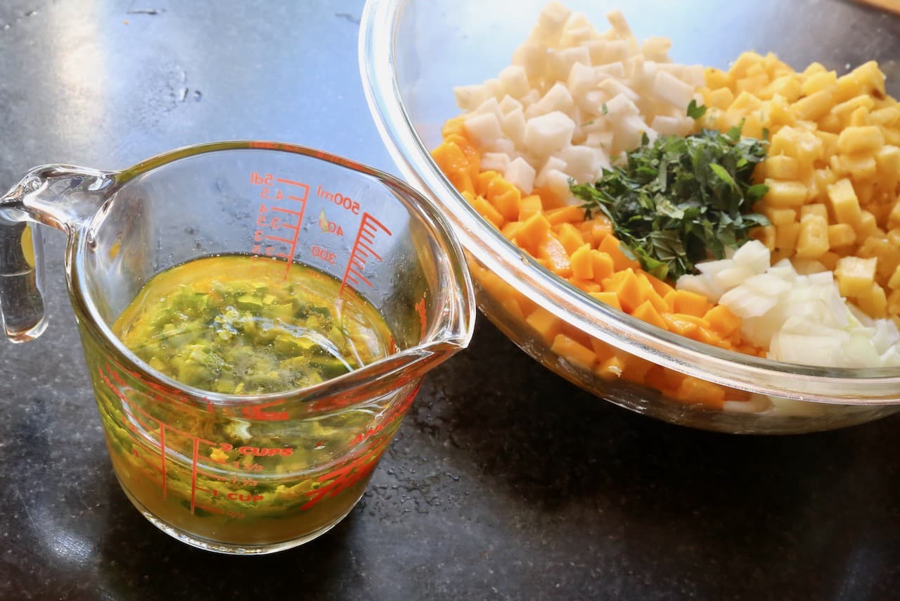 Prepare dressing in a measuring cup then toss Mexican Fruit Salad in a large mixing bowl.