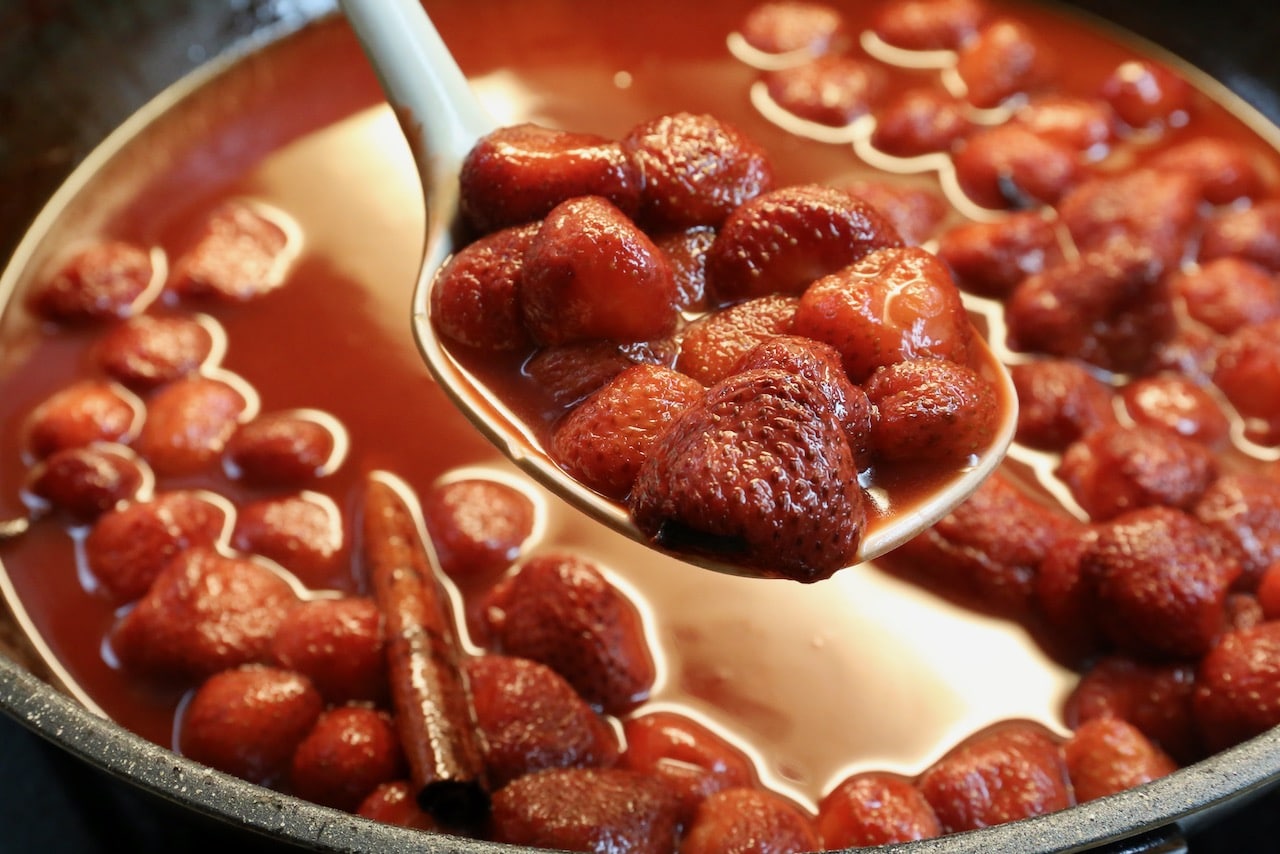 Stew Strawberry Compote until the fruit is fork tender and the syrup has thickened.