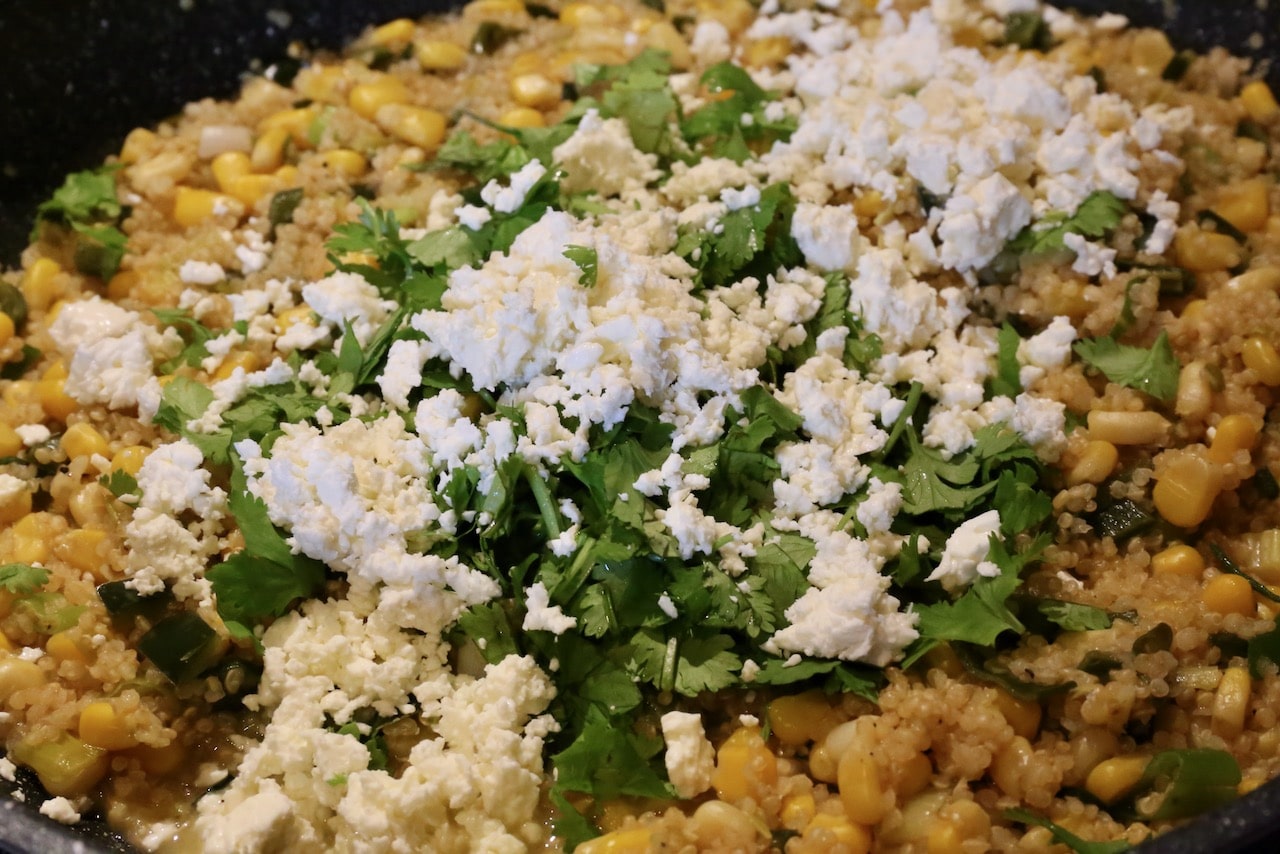 Before serving toss Risotto de Quinoa with chopped cilantro and crumbled feta cheese.