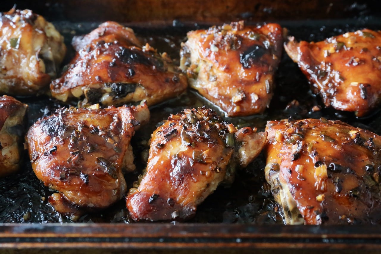 Cook chicken thighs in a roasting pan in your oven, or on a grill in your barbecue. 