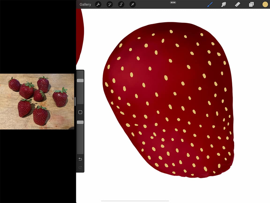 How to Draw a Strawberry: Map out your seeds first before painting the rest of the skin details.