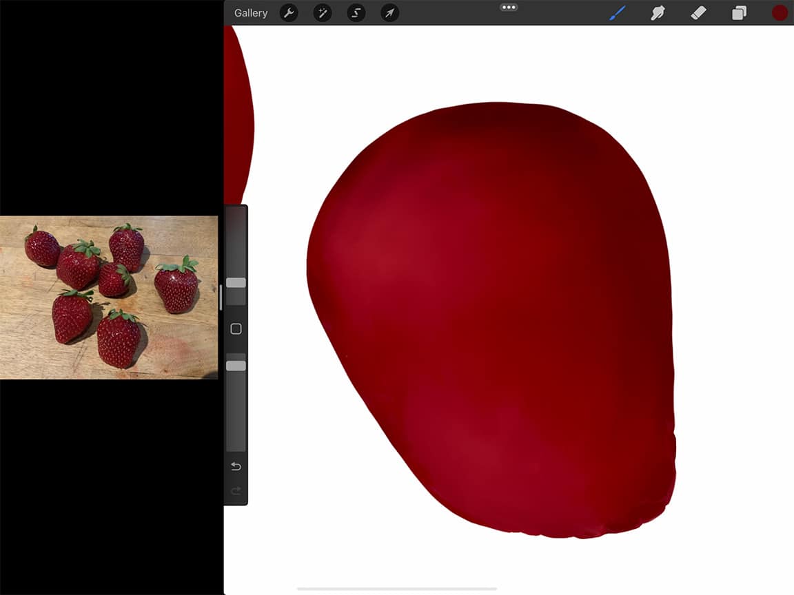 How to Draw A Strawberry: Start by painting and blending out your highlights and lowlights.