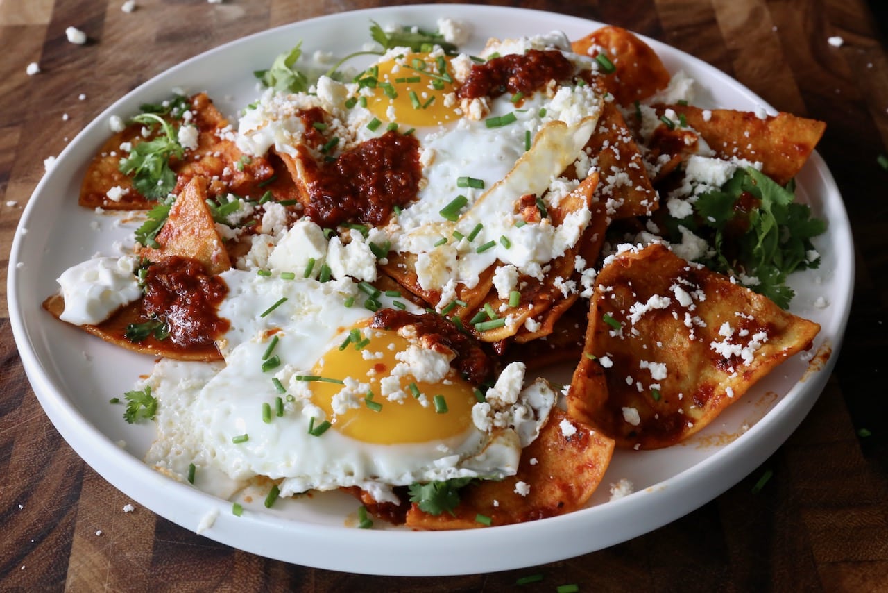 This Red Chilaquiles recipe is the perfect dish to serve at Mexican breakfast.