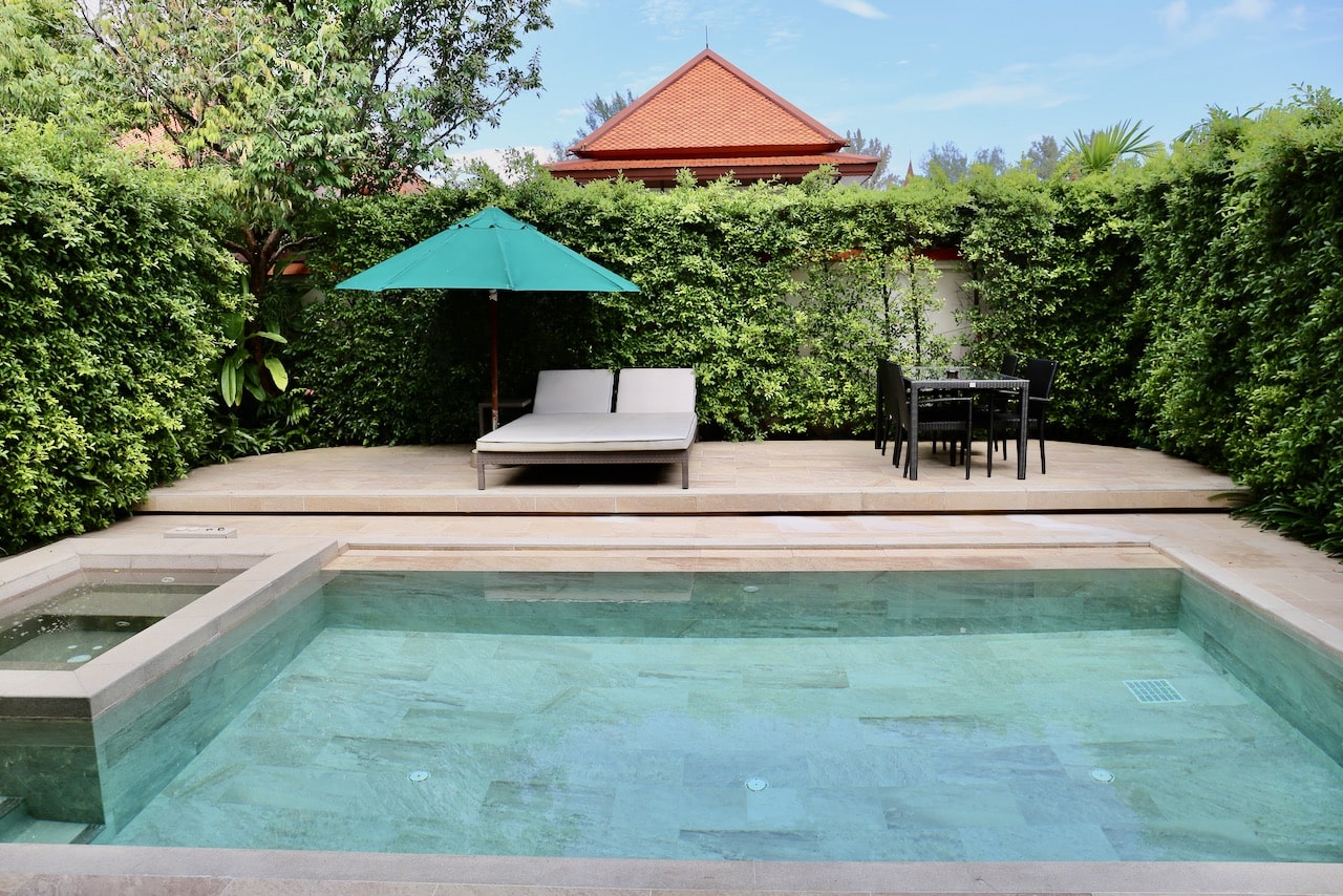 My pool villa featured a hot tub, comfy lounge chairs and outdoor dining table. 