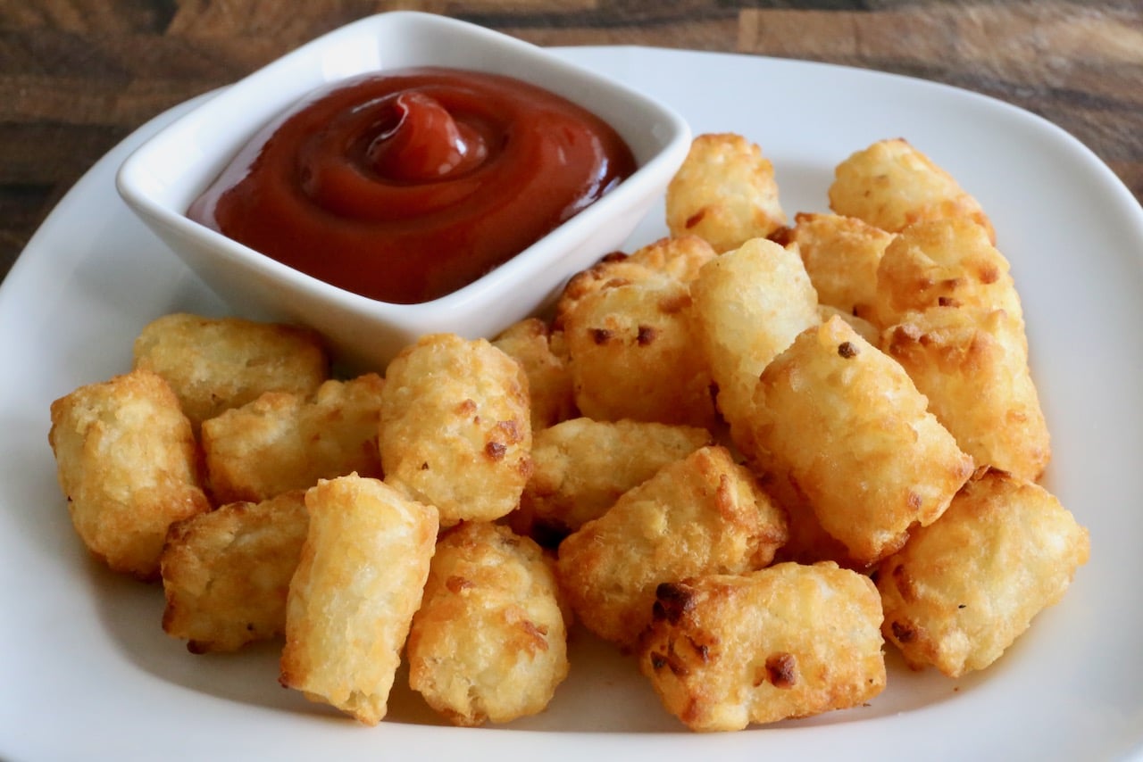We love serving Air Fryer Frozen Tater Tots with dips like ketchup.