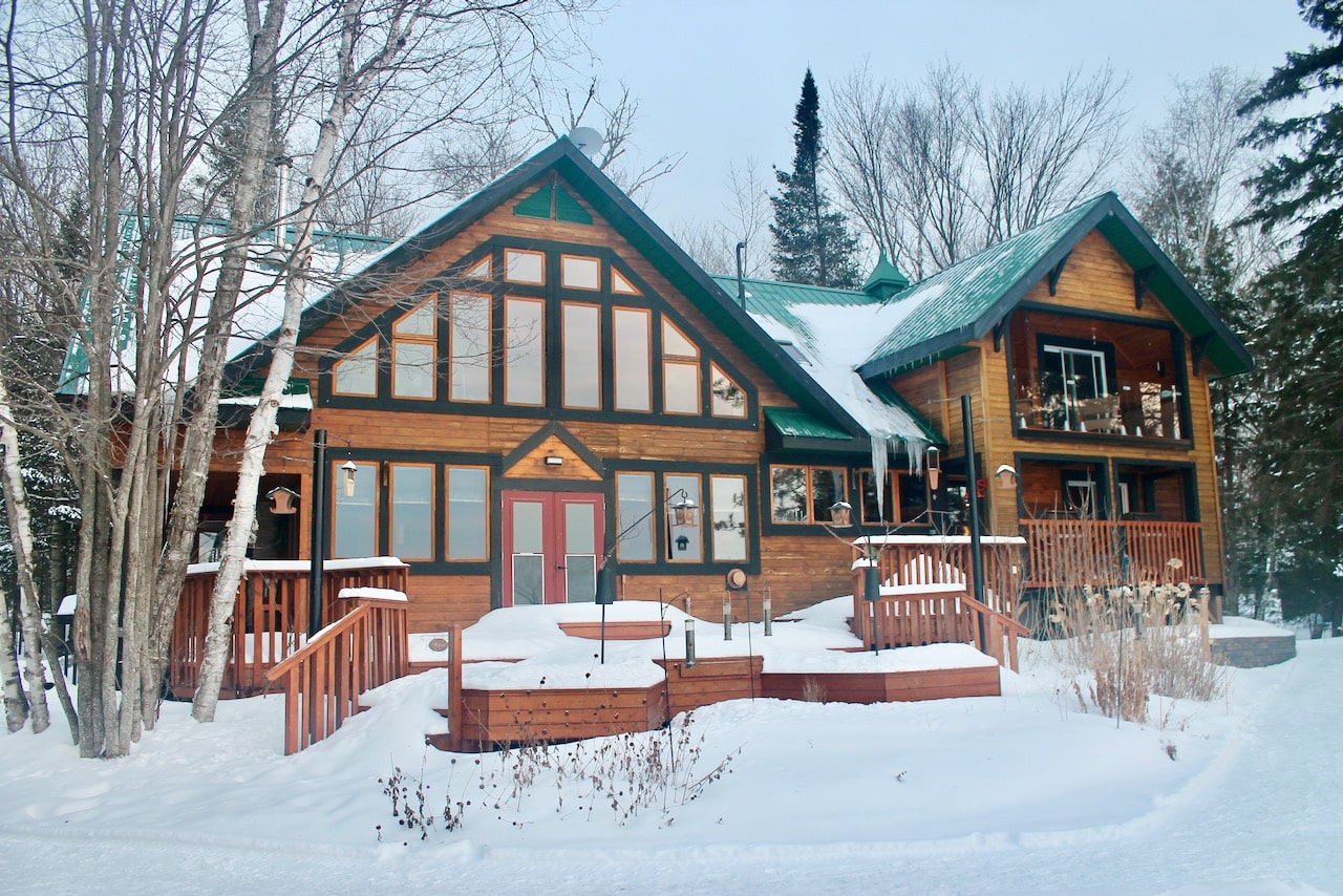 The Main House at Northern Edge Algonquin houses the lending library and the main dining room.