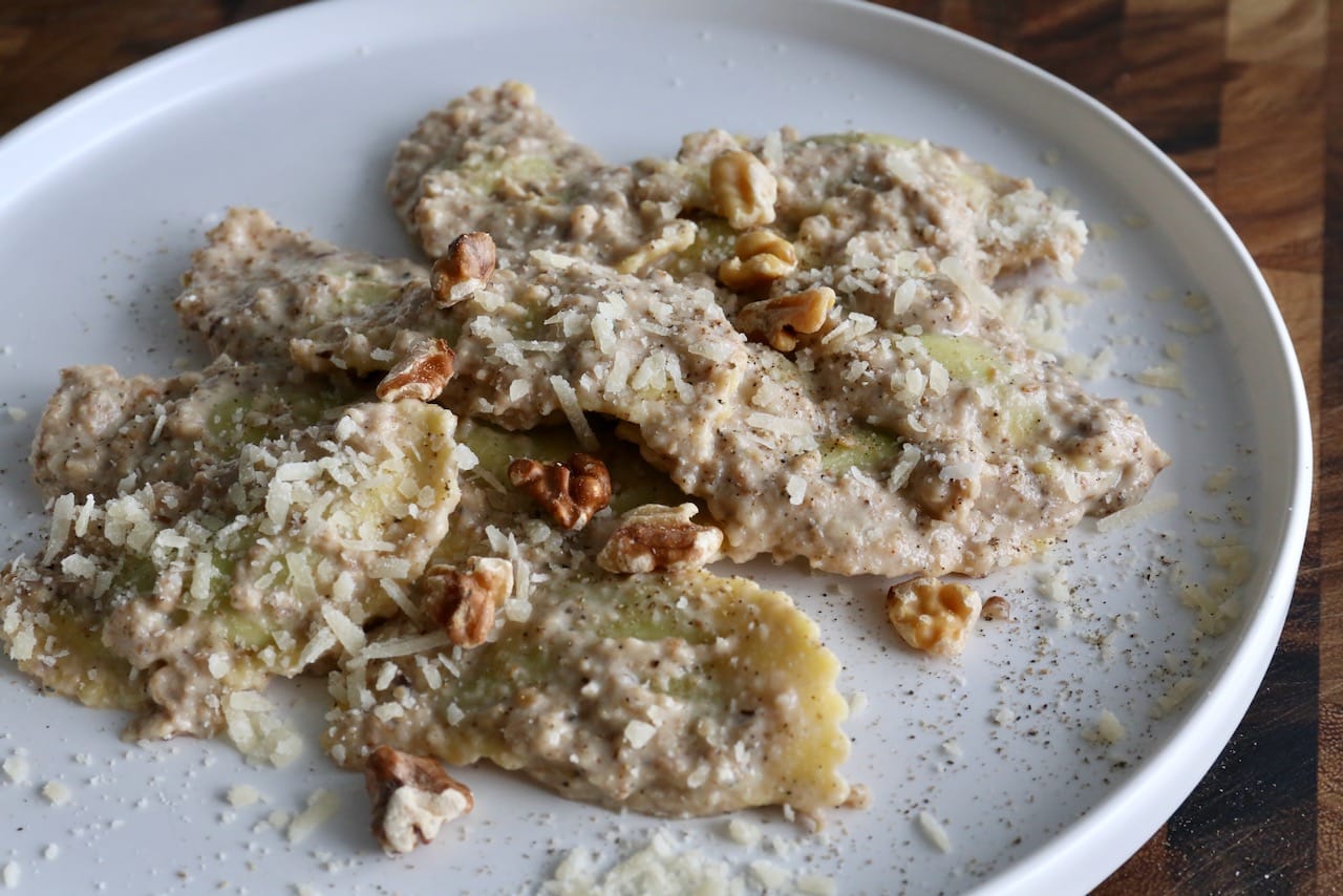 Pansotti Genovesi is a dish from Liguria features stuffed pasta tossed in a creamy walnut pesto sauce. 