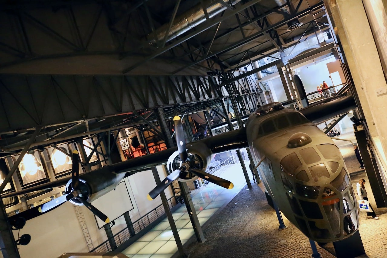 A war plane hangs inside the Warsaw Uprising Museum.