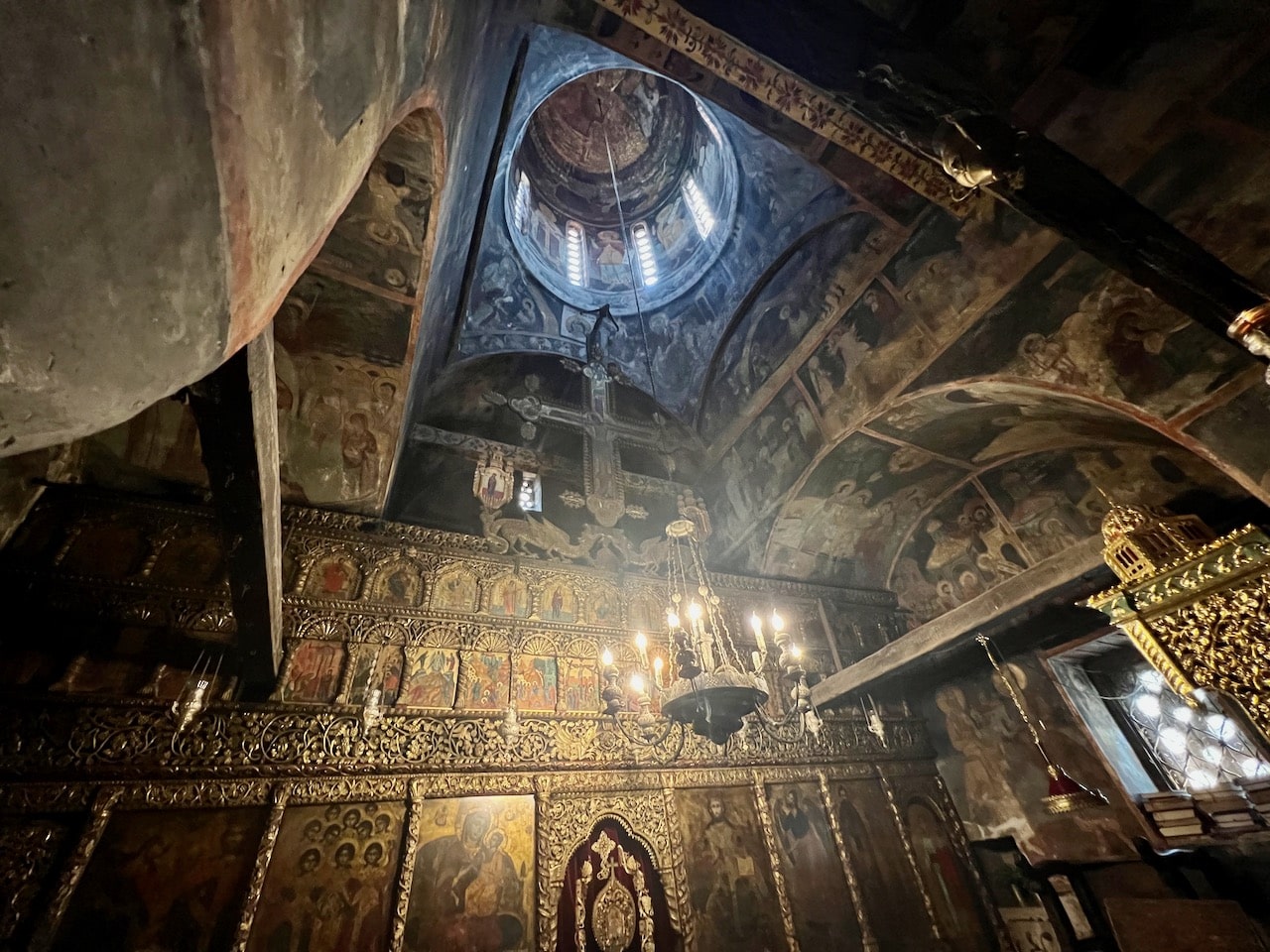 The moody ancient interior of the Monastery of Saint Naum.