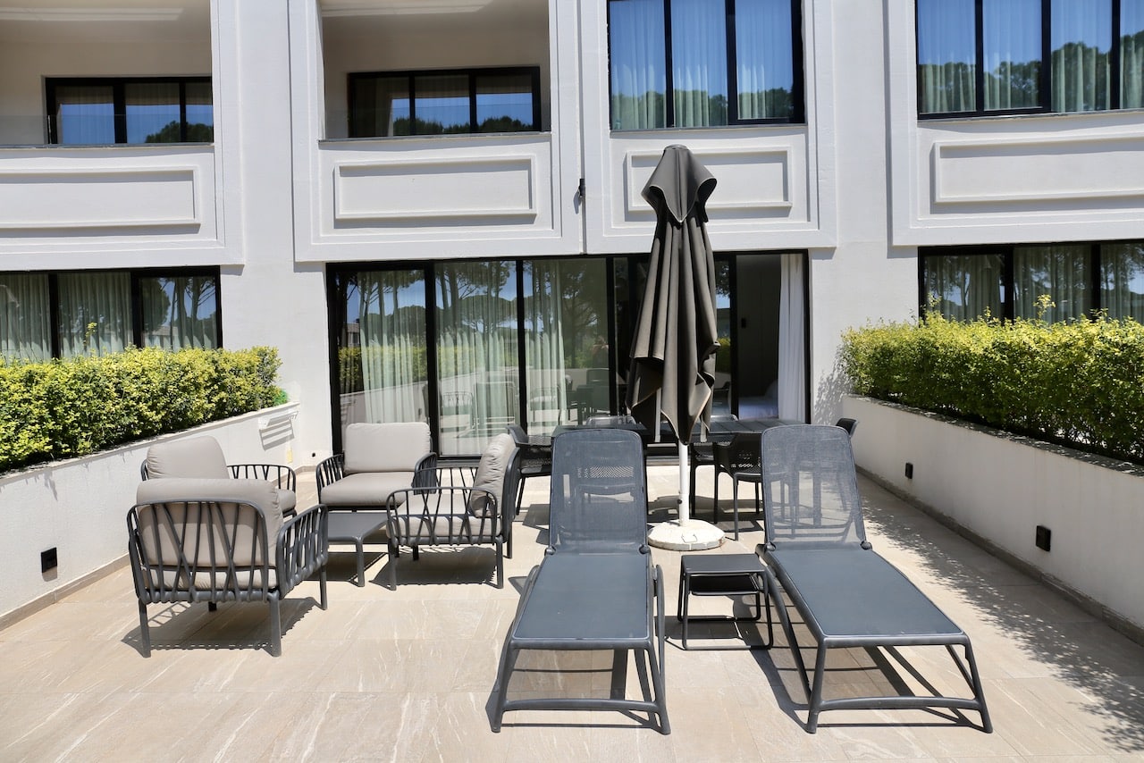 Suite guests enjoy a spacious outdoor patio at Movenpick Hotel Lalez Durres.
