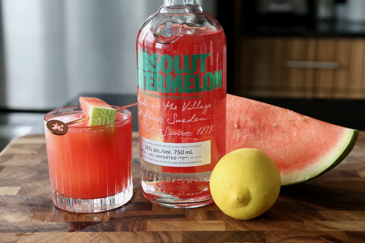 Garnish each cocktail glass with a watermelon slice.