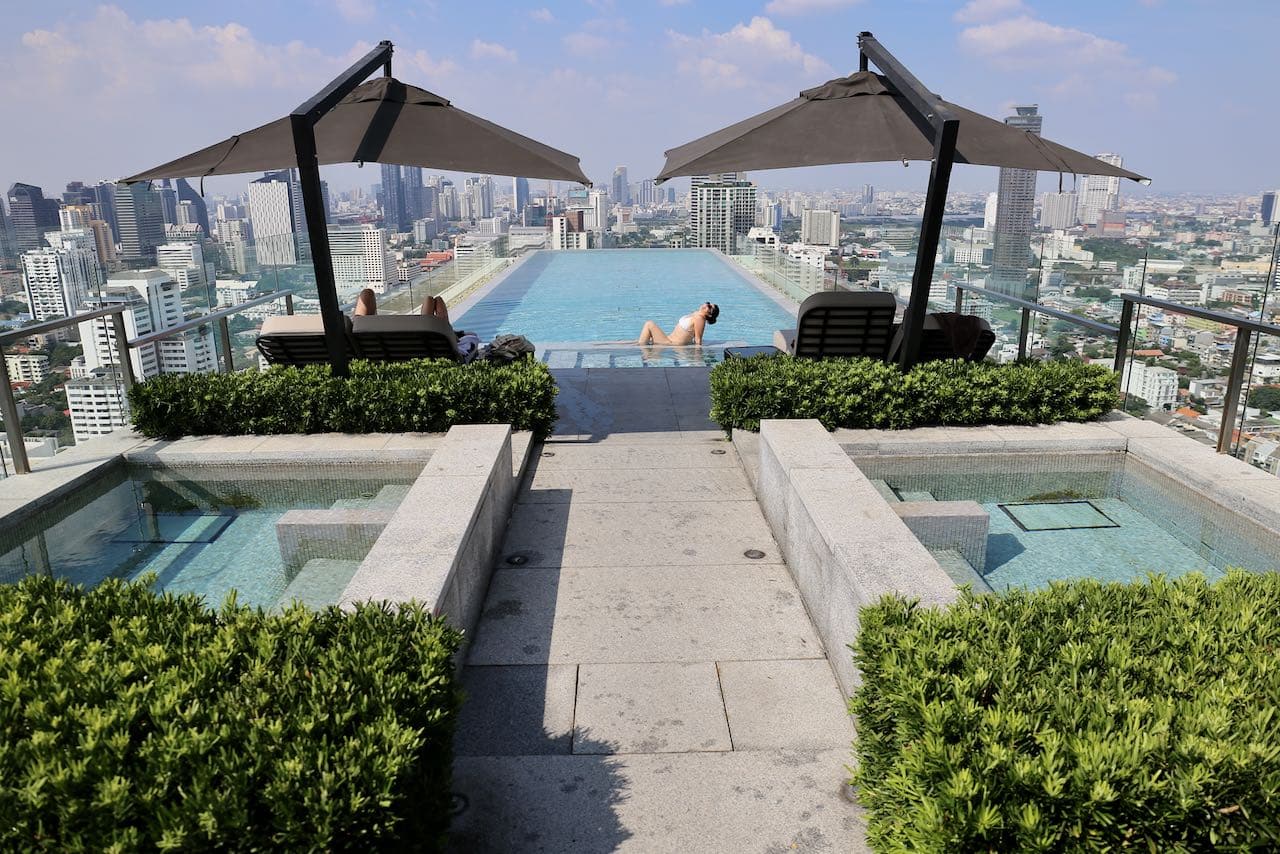 The jaw-dropping views at 137 Pillars Bangkok's rooftop infinity pool. 