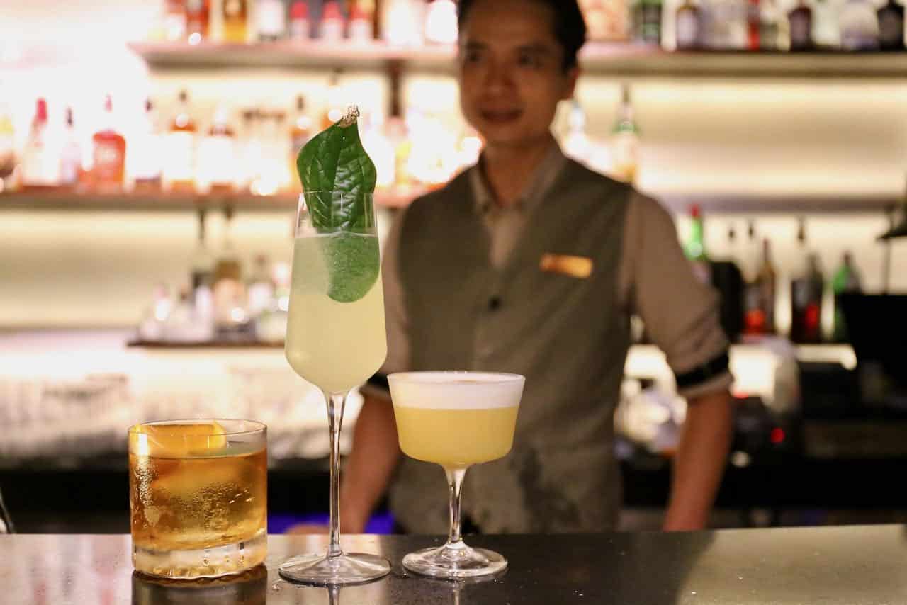 Enjoy expertly crafted cocktails inspired by Thai flavours at the dapper Jack Bain's Bar.