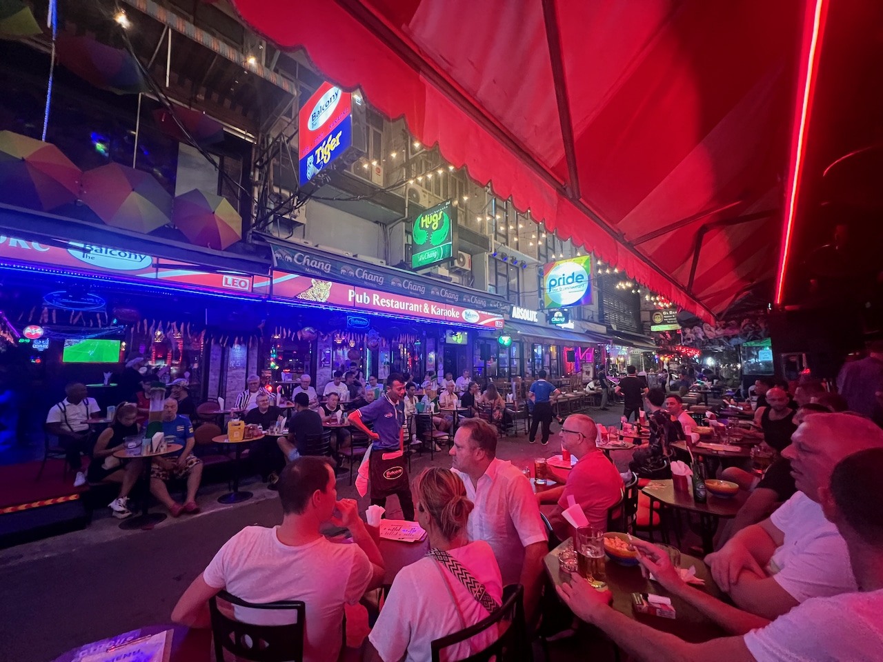 Enjoy people watching on a patio at one of the many Bangkok Gay Bars along Silom Soi 4.