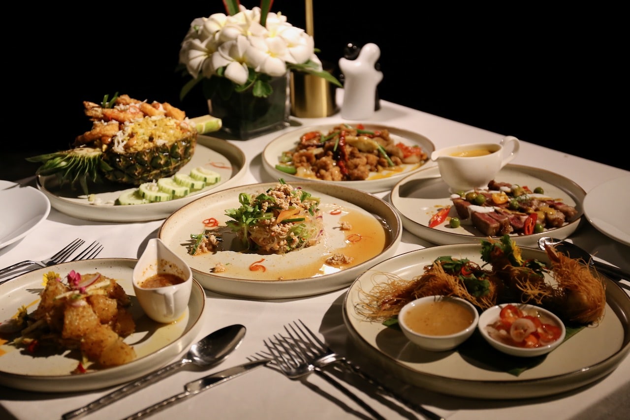 Enjoy a traditional Thai feast at The Racha Resort's signature restaurant, Earth Cafe.