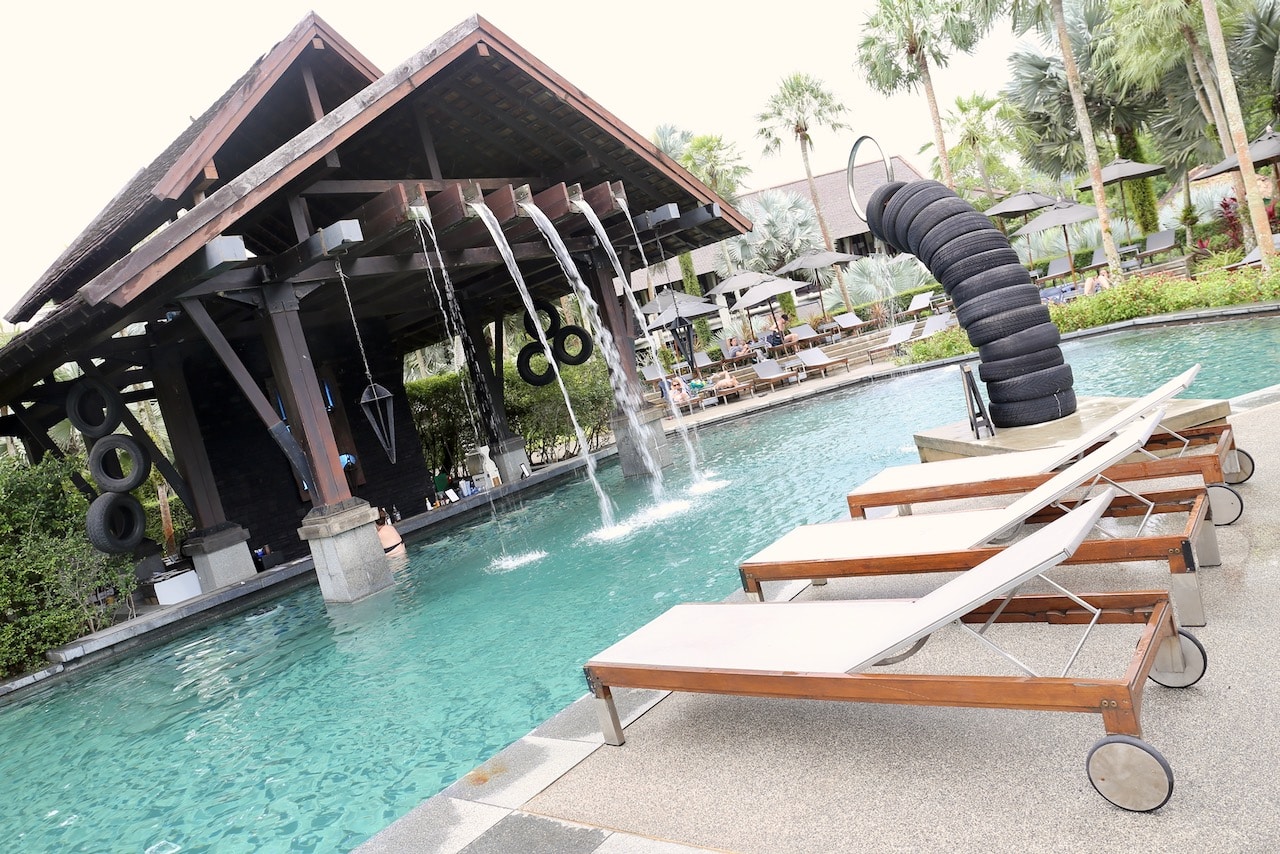 Pully Pool & Bar has a swim-up bar with fun waterfall and playful sculpture made of used car tires.