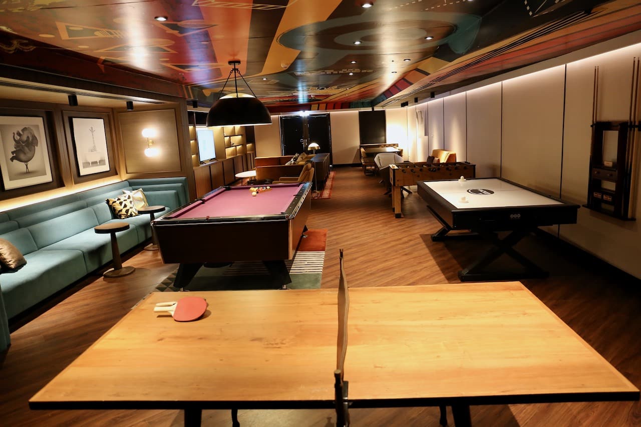The Den is the perfect place to play at night or on a rainy day featuring ping pong, pool and foosball. 