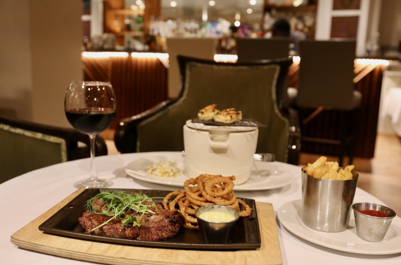 Enjoy fine wine, steaks and seafood at Palm Terrace Restaurant.